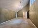 Bedroom with high ceilings, a chandelier, neutral-toned walls, plush carpet and an attached bathroom at 2900 Sylvania Dr, Raleigh, NC 27607