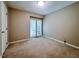 Neutral bedroom with carpeted floor features double window and ample natural light at 2900 Sylvania Dr, Raleigh, NC 27607
