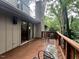 Wooden deck overlooking a lush green yard, creating a peaceful retreat at 2900 Sylvania Dr, Raleigh, NC 27607