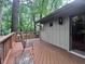 Wooden deck with chairs, perfect for outdoor relaxation and entertaining at 2900 Sylvania Dr, Raleigh, NC 27607