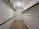 Spacious walk-in closet featuring custom shelving and ample storage for organization at 2900 Sylvania Dr, Raleigh, NC 27607