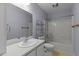 Bathroom featuring a tub and shower combo with blue paint and vanity with sink at 304 Foxcroft Dr, Timberlake, NC 27583