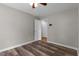 Neutral bedroom featuring vinyl plank flooring, ceiling fan, and baseboard trim at 304 Foxcroft Dr, Timberlake, NC 27583