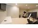 This workout area features a treadmill, a squat rack, and Hydrow rower at 308 Wescott Ridge Dr, Holly Springs, NC 27540