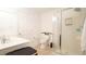 This bathroom features a shower stall with sliding doors, and a toilet at 308 Wescott Ridge Dr, Holly Springs, NC 27540