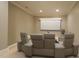 This theater room offers reclining seats, and a screen in a cozy setting at 308 Wescott Ridge Dr, Holly Springs, NC 27540