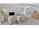 Neutral bonus room featuring a couch, desk, and entertainment space with carpeted floors at 3119 Guiding Light Rd, Raleigh, NC 27610