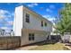 This is the exterior of this two-story home featuring a backyard, patio, and fence at 3119 Guiding Light Rd, Raleigh, NC 27610