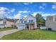 Attractive two-story home with a well-manicured lawn and a welcoming facade at 3119 Guiding Light Rd, Raleigh, NC 27610