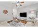 Comfortable living room with hardwood floors, modern lighting, and a relaxing atmosphere at 3119 Guiding Light Rd, Raleigh, NC 27610