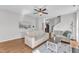 Inviting living room with hardwood floors, ceiling fan, and comfortable seating at 3119 Guiding Light Rd, Raleigh, NC 27610