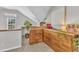 This loft area has a vaulted ceiling, a record player, and natural light at 3119 Guiding Light Rd, Raleigh, NC 27610