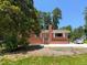 Charming single-story brick house with white trim, steps to the front door, and a well-maintained lawn at 3323 Baugh St, Raleigh, NC 27604