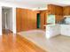 Bright hallway with hardwood floors and an open closet at 3323 Baugh St, Raleigh, NC 27604