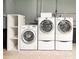 Laundry area in basement featuring front-load washer and dryer at 3323 Baugh St, Raleigh, NC 27604