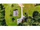 Aerial view of home with long drive, ample parking and surrounded by trees at 3511 Corbett Rd, Mebane, NC 27302