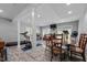Basement living space with recessed lights, exercise equipment, and a dining table at 3511 Corbett Rd, Mebane, NC 27302