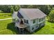 Two-story home featuring a side porch, deck and lots of windows at 3511 Corbett Rd, Mebane, NC 27302