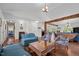Spacious living room with hardwood floors, fireplace, and comfortable seating, ideal for entertaining and relaxation at 3511 Corbett Rd, Mebane, NC 27302