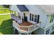 Lovely side porch of a home with deck and a grill at 3511 Corbett Rd, Mebane, NC 27302