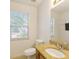 Cozy bathroom featuring a granite vanity and well-lit mirror, offering a functional design at 3610 Long Ridge Rd, Durham, NC 27703