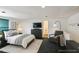 Relaxing bedroom with neutral tones, a soft rug, and a seating area for unwinding at 3610 Long Ridge Rd, Durham, NC 27703
