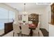 Formal dining room featuring a chandelier, and a wooden hutch for elegant entertaining at 3610 Long Ridge Rd, Durham, NC 27703
