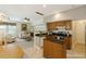 Bright living space featuring an open kitchen, comfortable seating, and stylish decor at 3610 Long Ridge Rd, Durham, NC 27703