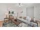 Bright living room featuring modern decor, neutral tones, and hardwood floors at 3973 Volkswalk Pl, Raleigh, NC 27610