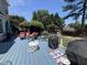 Spacious deck with seating area, grill, and lush greenery, ideal for outdoor entertaining at 4117 Mangrove Dr, Raleigh, NC 27616