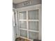 Functional laundry room area with sliding doors, offering both privacy and style at 4117 Mangrove Dr, Raleigh, NC 27616