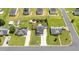 Wide aerial view of the neighborhood featuring a home with a large manicured lawn, storage shed, and privacy fence at 413 Hallie Long Ln, Burlington, NC 27217