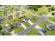 Wide aerial view of the neighborhood featuring a home with a large manicured lawn, storage shed, and privacy fence at 413 Hallie Long Ln, Burlington, NC 27217