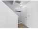 Bright foyer featuring wood-look flooring, a coat rack, and a staircase to the second floor at 413 Hallie Long Ln, Burlington, NC 27217