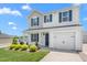 This lovely home boasts a well-kept lawn and a welcoming front porch, perfect for suburban living at 413 Hallie Long Ln, Burlington, NC 27217