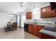 Open kitchen area with modern appliances and a connected dining area with natural light at 413 Hallie Long Ln, Burlington, NC 27217