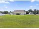 Wide backyard offering a serene view of the surrounding neighborhood and ample space for outdoor enjoyment at 50 N Nolan Park Dr, Selma, NC 27576