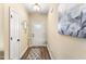 Welcoming foyer features wood-look flooring and neutral paint, leading into the home at 50 N Nolan Park Dr, Selma, NC 27576