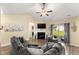 Inviting living room features a fireplace, neutral tones, and access to an outdoor patio area at 50 N Nolan Park Dr, Selma, NC 27576