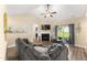 Cozy living room with vaulted ceilings, comfortable seating, and a view of the yard at 50 N Nolan Park Dr, Selma, NC 27576