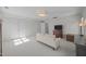 Bright, spacious bedroom with carpet, a sofa, closet doors and natural light from windows at 513 Moultonboro Ave, Wake Forest, NC 27587