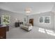 Spacious bedroom with carpet, neutral paint, a sofa, and plenty of natural light at 513 Moultonboro Ave, Wake Forest, NC 27587