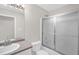 Bathroom with a shower over tub and sink with neutral countertop at 514 Lipscomb Grove Church Rd, Hillsborough, NC 27278