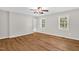 Bright bedroom with ceiling fan and two sunny windows at 514 Lipscomb Grove Church Rd, Hillsborough, NC 27278