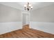 Bright dining room with beautiful floors and decorative trim at 514 Lipscomb Grove Church Rd, Hillsborough, NC 27278