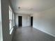 Bedroom with multiple windows and light walls, creating a spacious and airy atmosphere at 5428 Jaeger Dr # 45, Graham, NC 27253