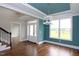 Bright entryway features large windows and beautiful hardwood floors at 5491 Silk Hope Gum Springs Rd, Siler City, NC 27344