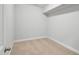 This carpeted bedroom is spacious with light gray walls and features one window for natural lighting at 555 Forestville Rd, Wake Forest, NC 27587