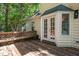 Wooden back deck with seating and natural light, situated off the back of the home at 616 Cross Timbers Dr, Durham, NC 27713