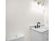 Bathroom with updated vanity, modern black faucet, and a marble countertop at 616 Cross Timbers Dr, Durham, NC 27713